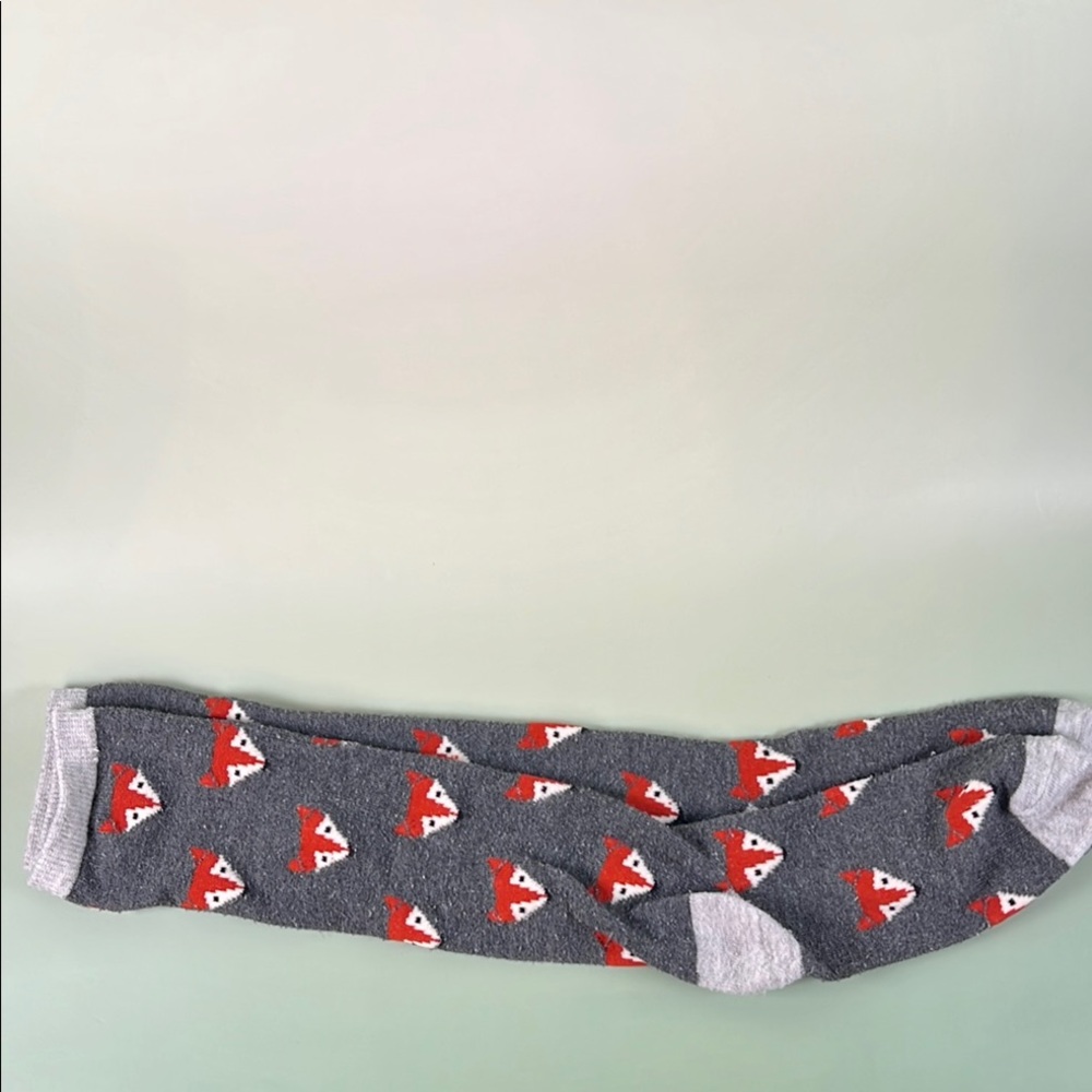 Gray and Red Patterned Fox Socks

Worn condition 
Smoke free pet free